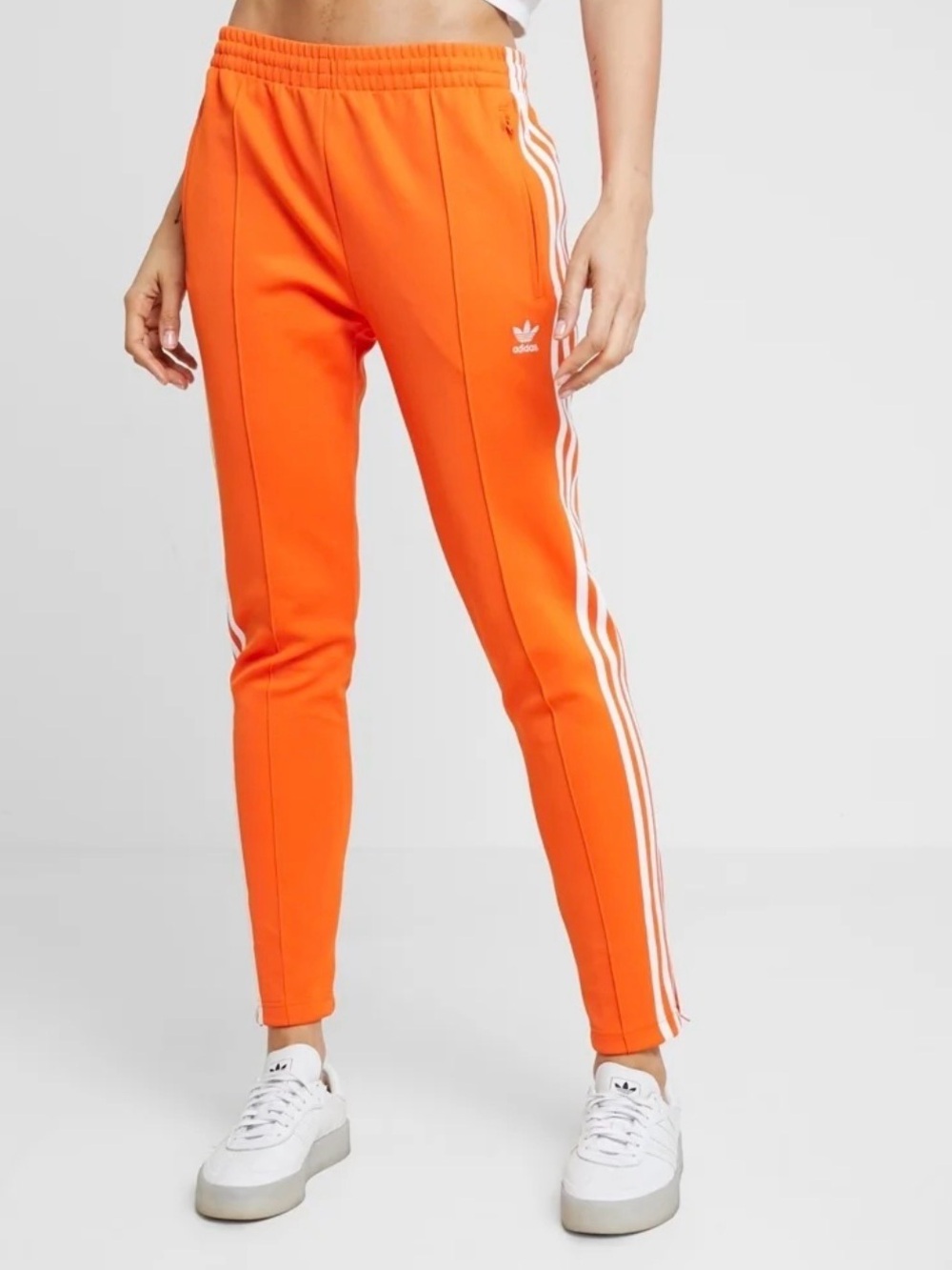 adidas Originals Women's Orange Slim Track Pants with White Stripes